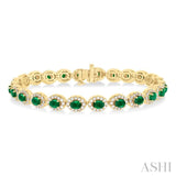 2 1/6 ctw Oval Cut 4X3 MM Emerald and Round Cut Diamond Halo Precious Tennis Bracelet in 14K Yellow Gold