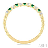 1.75 MM Emerald and 1/6 Ctw Round Cut Diamond Precious Wedding Band in 14K Yellow Gold