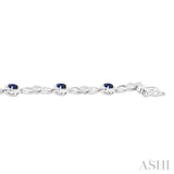 1/20 Ctw Oval Cut 4X3MM Sapphire and Round Cut Diamond Precious Fashion Bracelet in 10K White Gold